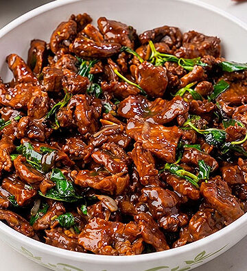 Authentic Thai Beef Pad Kra Pao served freshly made in a bowl