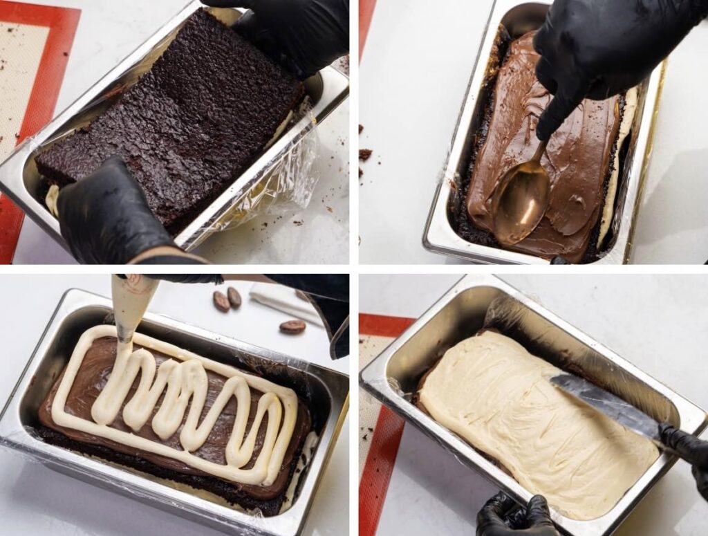 Adding the Second Cake Layer Second chocolate cake layer placed over chocolate and salted caramel ganache layers.