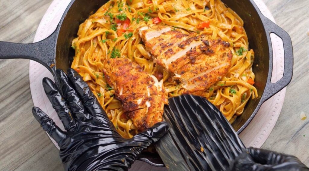 Slice and serve the chicken Freshly cooked and sliced juicy chicken served on a platter, ready for plating."